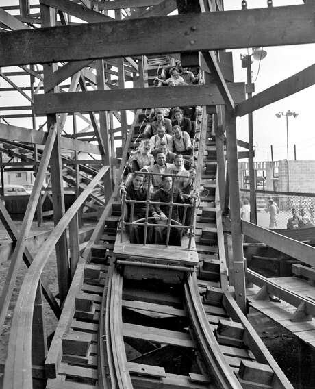 Customers at Playland-at-the-Beach (in 1948 it was called Whitney’s at the Beach) enjoy the thrills on the Big Dipper roller coaster, which was shut down in 1955 under a new city building code. Photo: Chronicle Staff Photo / The Chronicle 1948 / ONLINE_YES