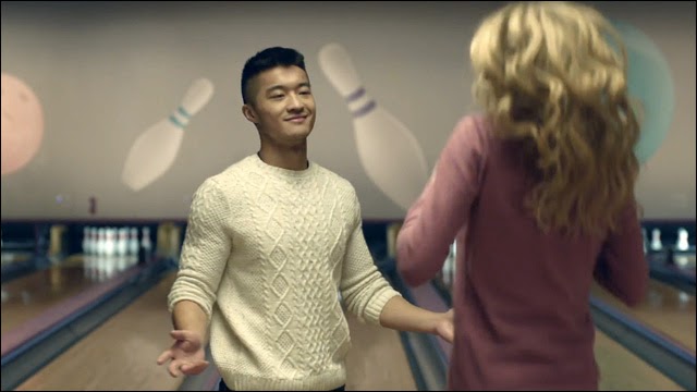 Asian guy singing in bathroom commercial