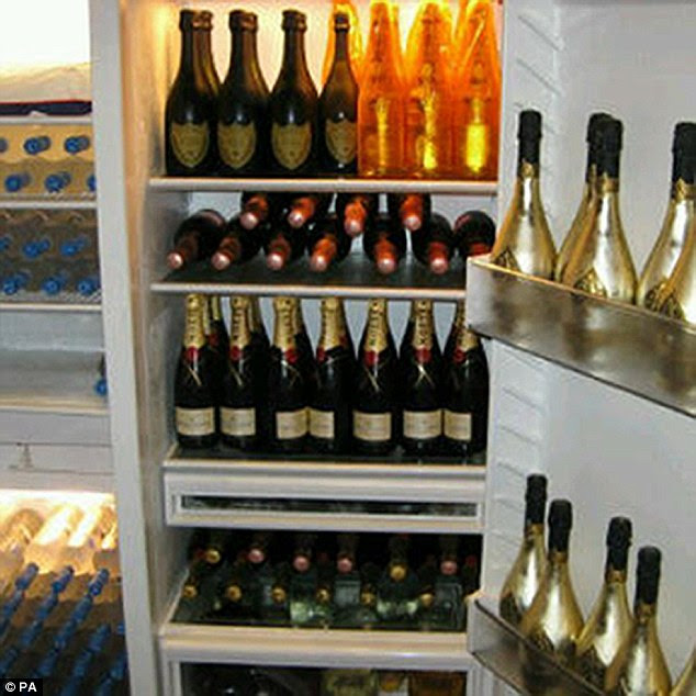 BEST QUALITY AVAILABLE
Undated handout photo issued by National Crime Agency of champagne in a fridge belonging to fraudster Frank Onyeachonam who has been jailed for eight years at the Old Bailey, London after he conned vulnerable pensioners out of their life savings with a bogus lottery scam to fund his millionaire's lifestyle. PRESS ASSOCIATION Photo. Issue date: Thursday July 3, 2014. For seven years, Onyeachonam, nicknamed "Fizzy" because of his love of champagne ran the UK operation of a global scam which was orchestrated from his native Nigeria and involved hundreds of perpetrators in several countries, detectives suspect. See PA story COURTS Lottery. Photo credit should read: National Crime Agency /PA Wire
NOTE TO EDITORS: This handout photo may only be used in for editorial reporting purposes for the contemporaneous illustration of events, things or the people in the image or facts mentioned in the caption. Reuse of the picture may require further permission from the copyright