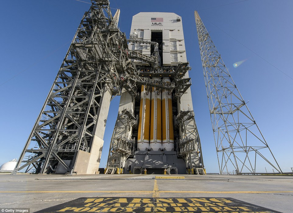 Heavy lifting: The United Launch Alliance Delta IV Heavy rocket carrying Orion burned through 450,000 gallons of hydrogen and oxygen fuel in order to produce  the two million pounds of thrust needed to lift the 815 ton space rocket out of Earth's atmosphere