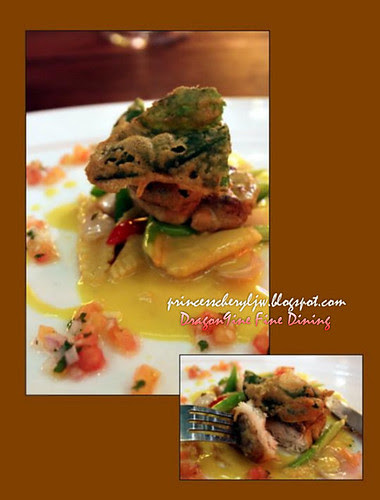 Dragon9ine crispy sea bass with butter orange sauce and tempura greens