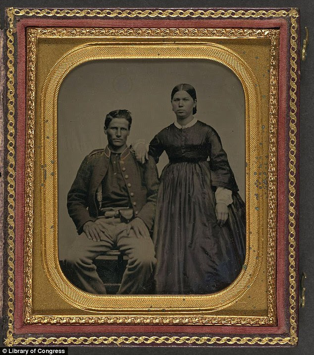 Collection: This photograph shows an unidentified Union soldier with his sweetheart; it is encased in a gilt leather frame