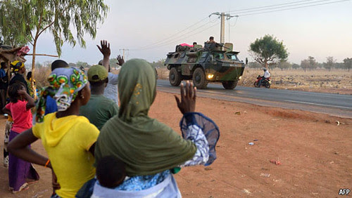 French tanks drive through the West African state of Mali. The imperialists are occupying and bombing the country to seize control of oil, uranium and gold. by Pan-African News Wire File Photos