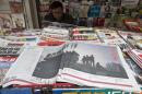 Southern Weekly newspaper copies are left on display at a newsstand in Guangzhou