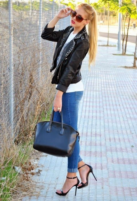 Very Confident View. Black Leather Jackets, Blue Jeans and High Heel Shoes with Suitable Accessories