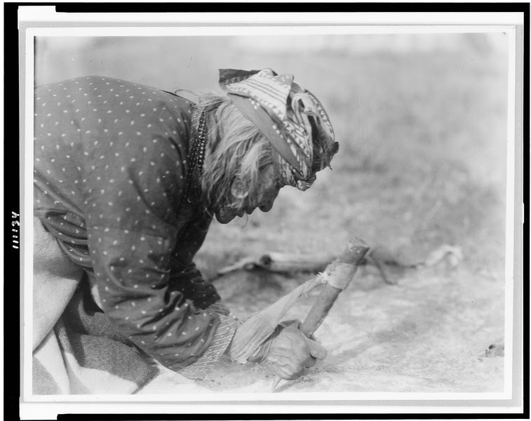 Description of  Title: [Blackfoot Indian fleshing a hide].  <br />Date Created/Published: c1927.  <br />Photograph by Edward S. Curtis, Curtis (Edward S.) Collection, Library of Congress Prints and Photographs Division Washington, D.C.