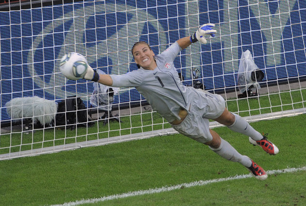 United States goalkeeper Hope Solo deflects a penalty shot during the quarterfinal match between Brazil and the United States at the Womenís Soccer World Cup in Dresden, Germany, Sunday, July 10, 2011