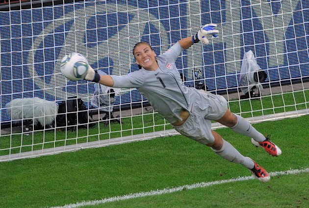 United States goalkeeper Hope Solo deflects a penalty shot during the quarterfinal match between Brazil and the United States at the WomenÃs Soccer World Cup in Dresden, Germany, Sunday, July 10, 2011