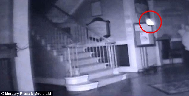 Spooky: Footage taken by the team apparently shows a ghostly orb  crossing the main staircase of the Liverpool Medical Institute, which was opened in 1837