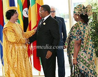 Tanzanian President Kikwete greeting African Union chair Khadafi of Libya at the AU Summit in Sirte. by Pan-African News Wire File Photos