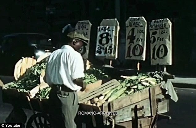 Fresh look: Everyday scenes like this market trader selling vegetables on a street corner were recorded