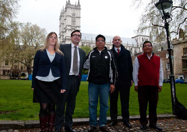 Ecuadorian Indigenous leaders Humberto Piaguaje (middle) and Guillermo Grefa (far right) meet with representatives from the Churh of England's Investment Department and Hermes Fund Managers at Westminster Abbey in London.