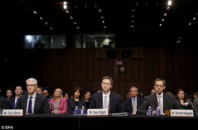 Colin Stretch, general counsel for Facebook (left) testified in a Senate hearing on Tuesday that ads placed by a Russian propaganda arm continued after President Trump won the White House, and were 'targeted at fomenting discord about the validity of his election'
