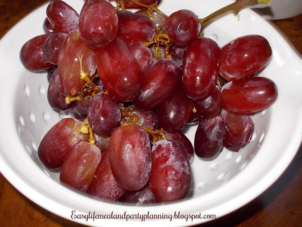 Frozen Grapes for a healthy snack or place frozen grapes in a glass of wine Frozen Grapes for a Hot Summer Day