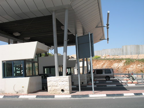 checking cars to Jerusalem, wall in background