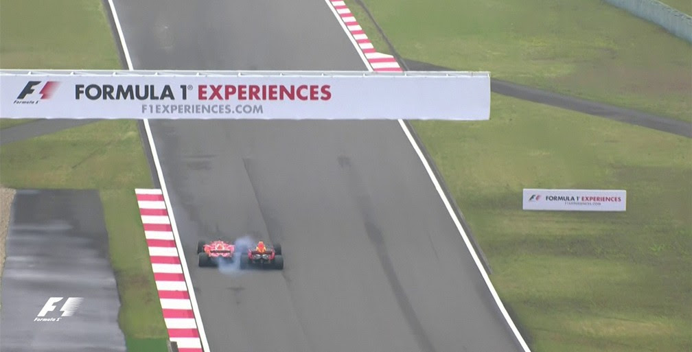 Vettel e Ricciardo tocaram rodas na disputa por posição (Foto: Reprodução)