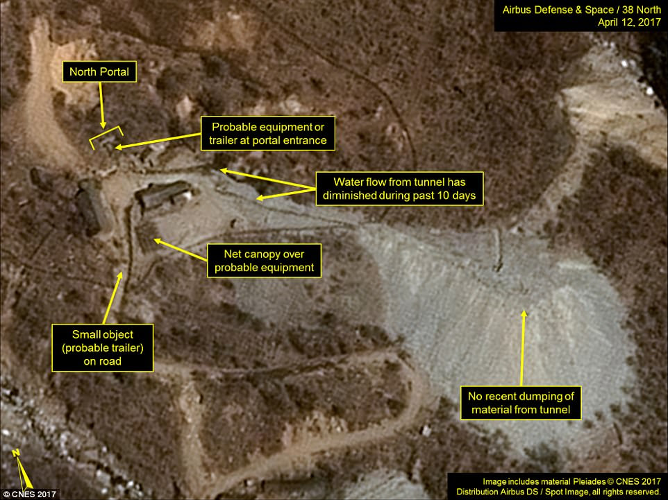 Satellite images of the Punggye-ri Nuclear Test Site taken on April 12 appears to show vehicles  parked around the North Portal of the site. North Korean monitoring service 38 North said the facility is 'primed and ready' for a sixth nuclear test