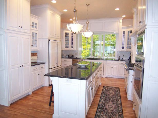 U-Shaped Layout - 5 Most Popular Kitchen Layouts on HGTV love the windows! Very open and the cab type finish above it!