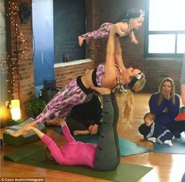 Image result for Coco Austin splays  gorgeous sister as yoga