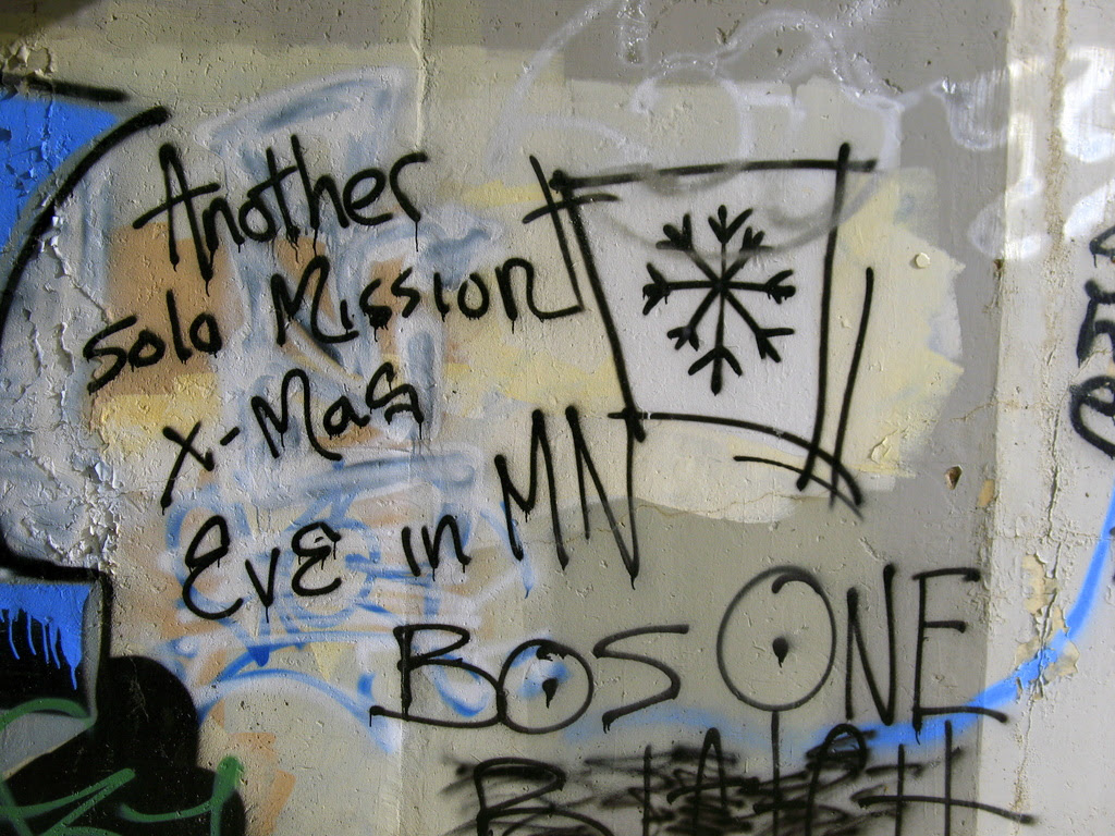 some graffiti found under the higway 61 overpass in the tunnel