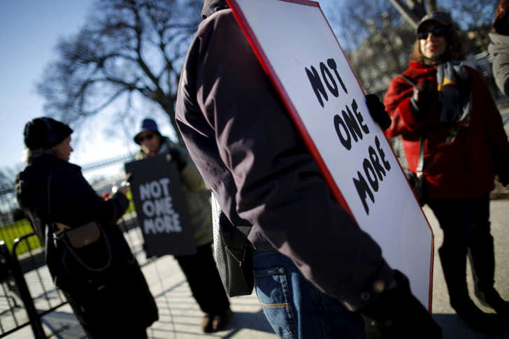 Gun control activists rally in front of the White House in Washington, January 4, 2016. President Barack Obama is expected to announce new gun control curbs this week, but he will have to decide whether to take bold action that would likely spark a major legal challenge from opponents or a more cautious route that may be less effective, legal experts said.