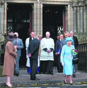 Queen Elizabeth II leaves St Michaels Roman Catholic church in Enniskillen, Northern Ireland, on Tuesday. The Queen’s visit here will include a historic meeting with deputy first minister Martin McGuinness, a former IRA leader.