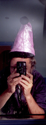 reflected self-portrait with Halina Mini 28 DF camera and pierrot hat by pho-Tony