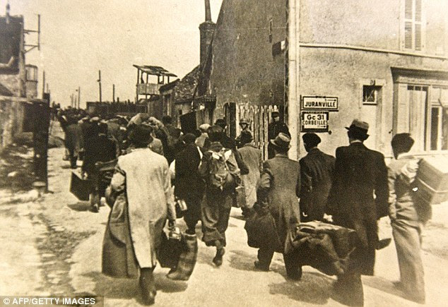 Captives: Jewish people arriving at the transit camp of Pithiviers, near Orleans, where they were placed under French police supervision before being transported to concentration camps