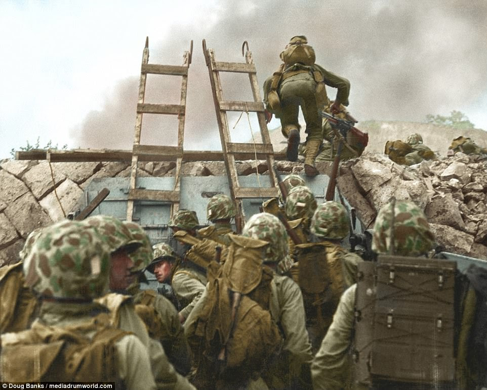 The images are made all the more poignant as tensions on the Korean peninsula continue to rise between Kim Jong-un and President Donald Trump. The United States first engaged with North Korean forces during the Korean War's Battle of Osan on July 5, 1950. Men are pictured above in battle during the Battle of Inchon
