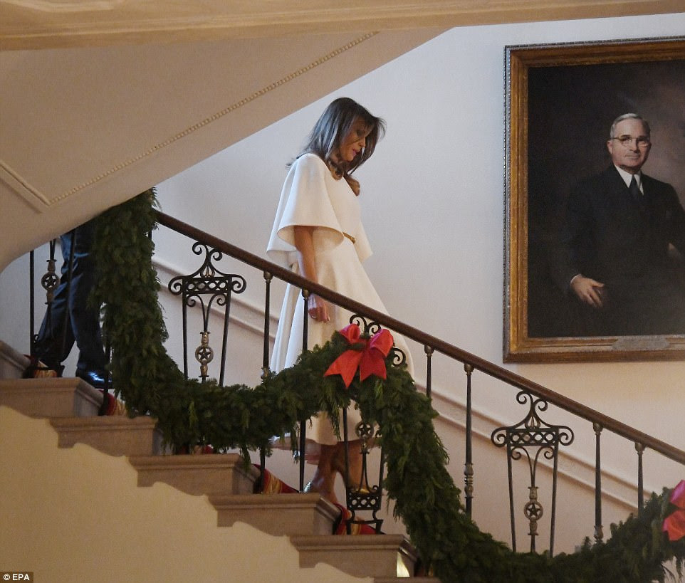 It's all in the details! Even the staircases at the White House have been decked with festive flourishes 