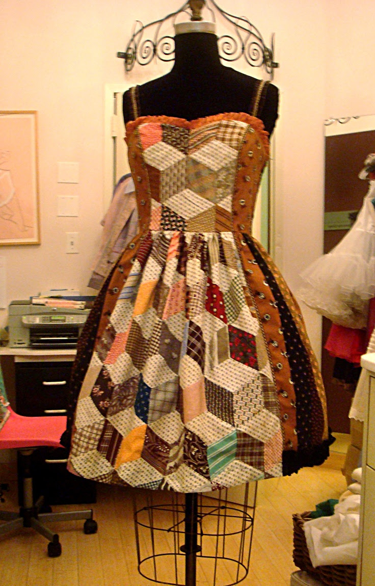 Mary Adams apron dress using hand pieced "tumbling blocks" from client's great grandmother.. Great inspiration from all those unfinished quilt pieces found at estate and garage sales..