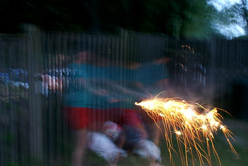 Running with sparklers.