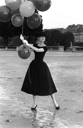 Audrey Hepburn during the filming of Funny Face, Tuileries Garden, Paris, 1956.  This picture was taken by famed American photographer David ‘Chim’ Seymour.