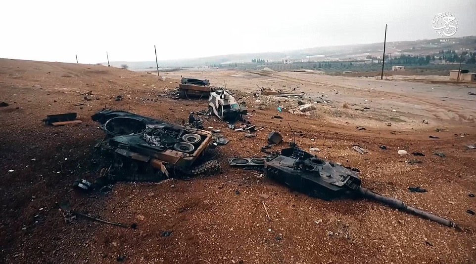 ISIS claimed it destroyed 10 of the Leopard 2 tanks, dubbed invincible in some quarters, and while the terror group's estimates are regularly exaggerated, analysis of fighting around al-Bab in Syria puts the figure at 'at least eight'. Pictured: The remnants of one of the German-built tanks as shown in a January 20, 2017 Isis video recorded near al-Bab. It was reportedly blown up by a mine. In the background is a destroyed Kobra armoured personnel carrier