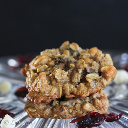 Quinoa Oatmeal Cookies with Cranberries and White Chocoalte, photography on a black background
