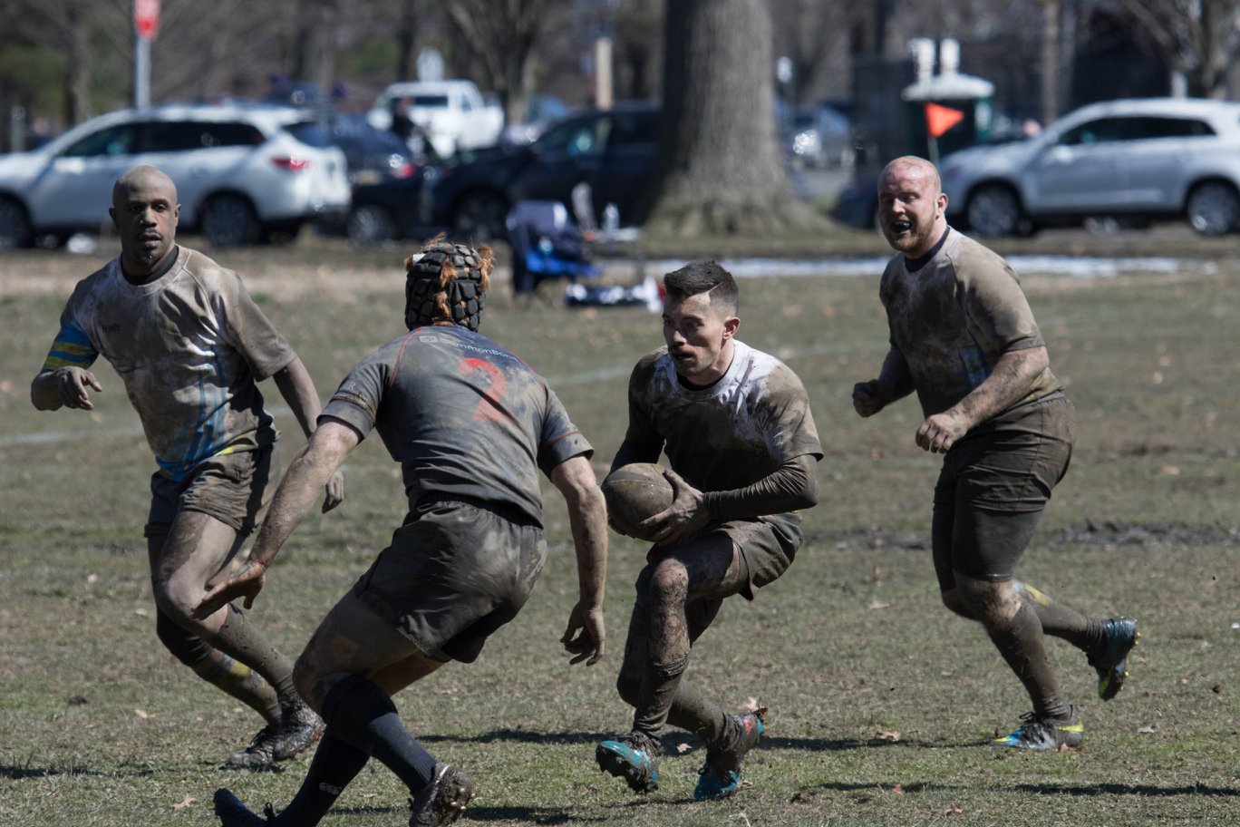 Action shot of Philly Gryphons in the Mud.