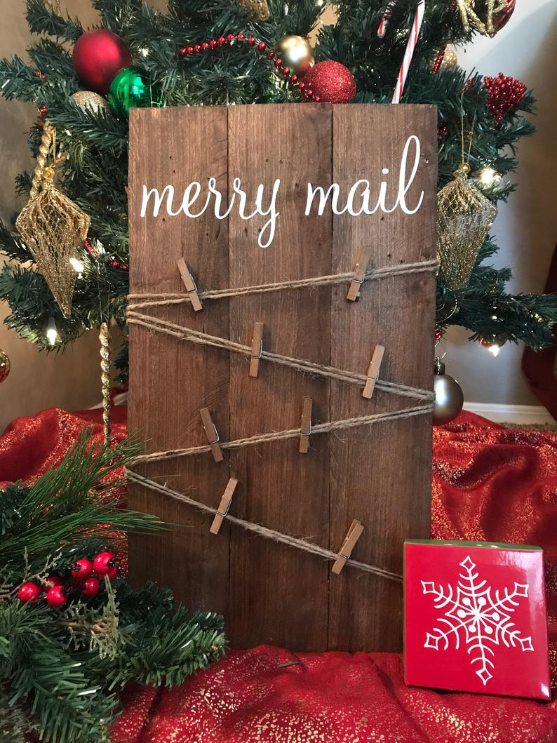Rustic Christmas Card Holder: These 25 DIY Christmas Card Holders - That Double As Festive Decor will allow you to beautifuly display your cards and will also give you some great decor. 