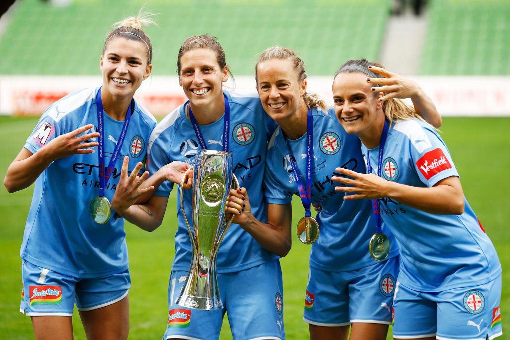 Stott (second from left) celebrates City's <a href='/leagues/english-championship'>Championship</a> triumph in 2019/20