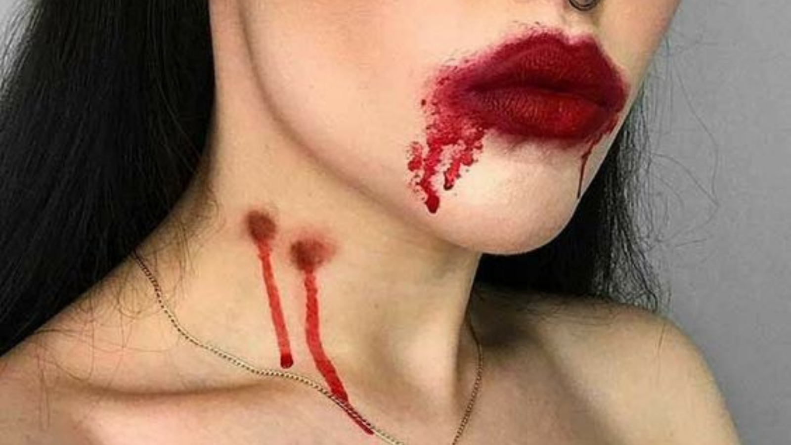 Mordida de vampiro na make artística de halloween