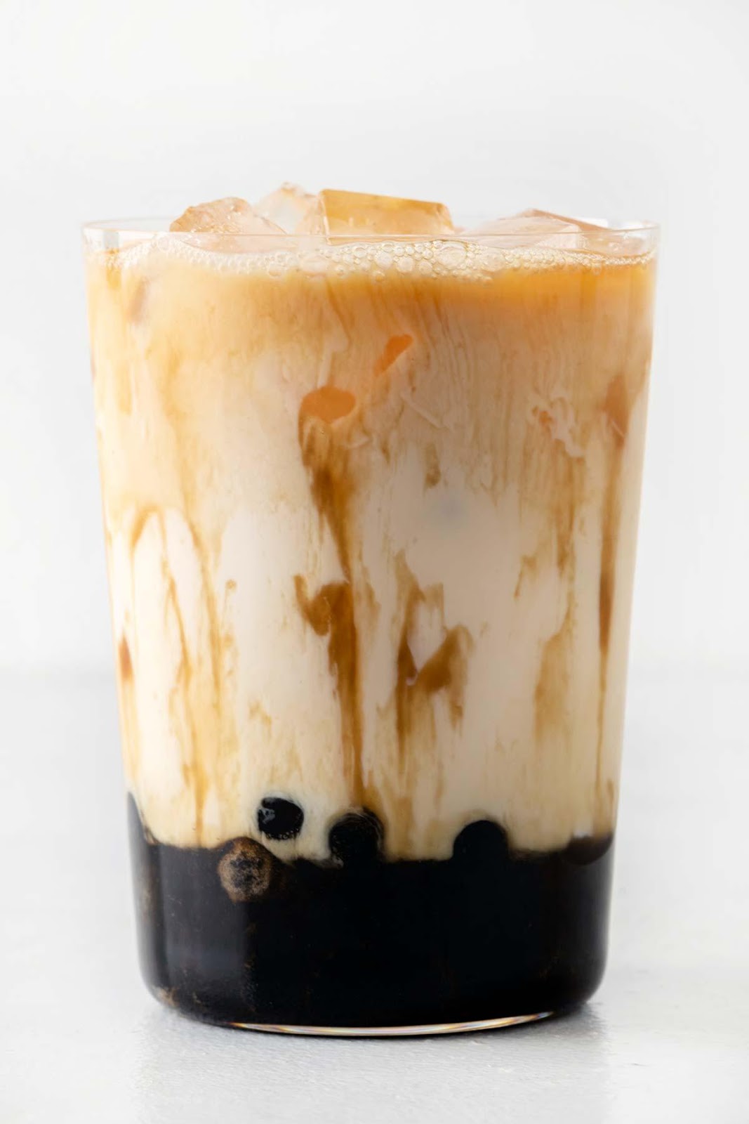 Brown Sugar Bubble Tea in a large glass with ice.