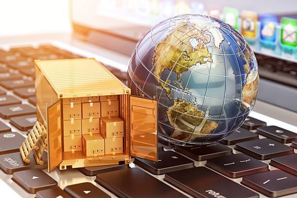 Internet shopping and e-commerce, package delivery concept Global freight transportation business, cargo container with cardboard boxes and Earth globe on laptop shipping container storage stock pictures, royalty-free photos & images