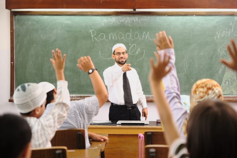 An Arabic teacher in a classroom