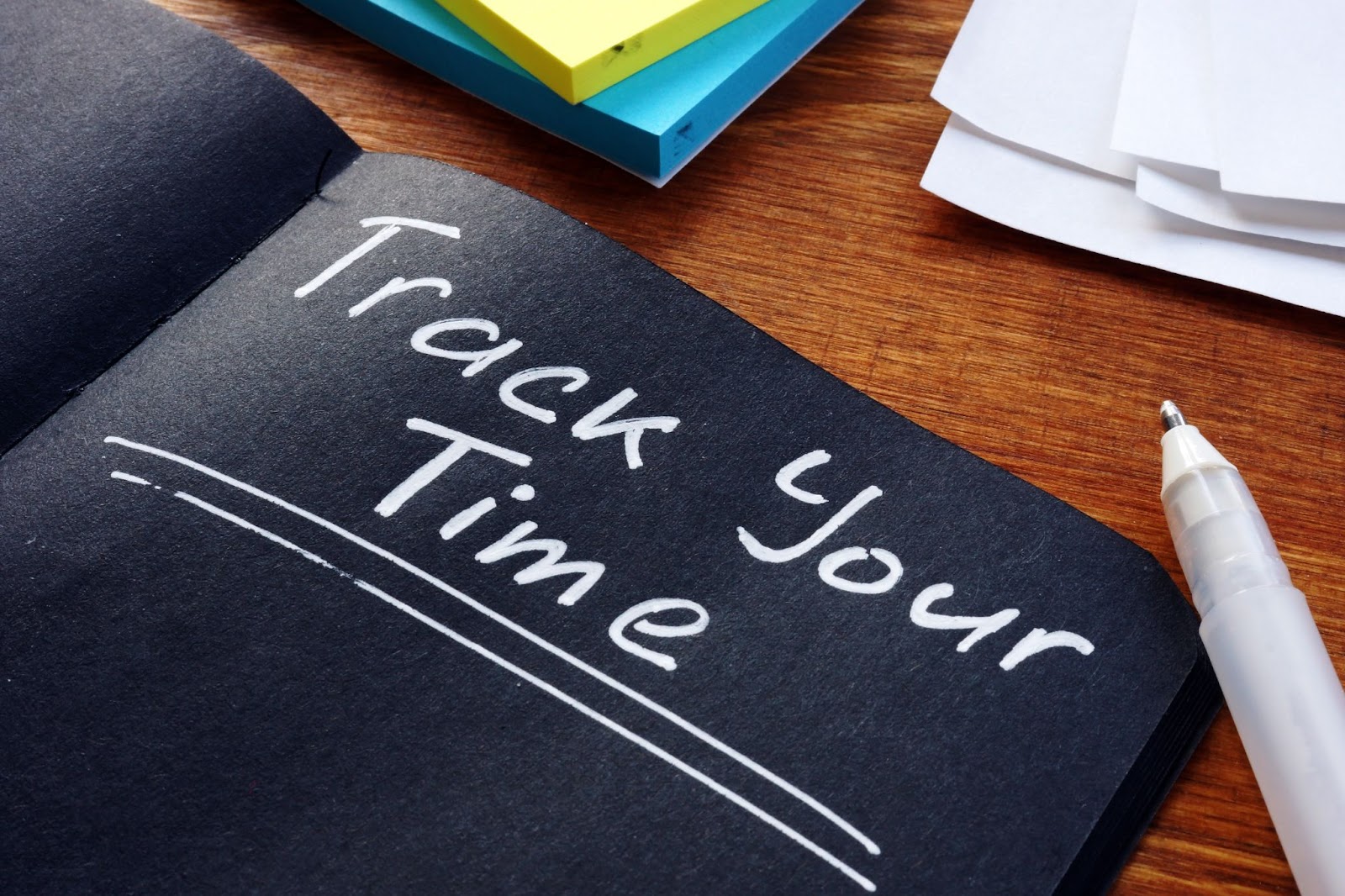 Track Your Time written in a notebook