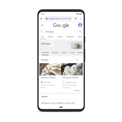 Immagine di uno smartphone che mostra la ricerca "Meringhe" su Google