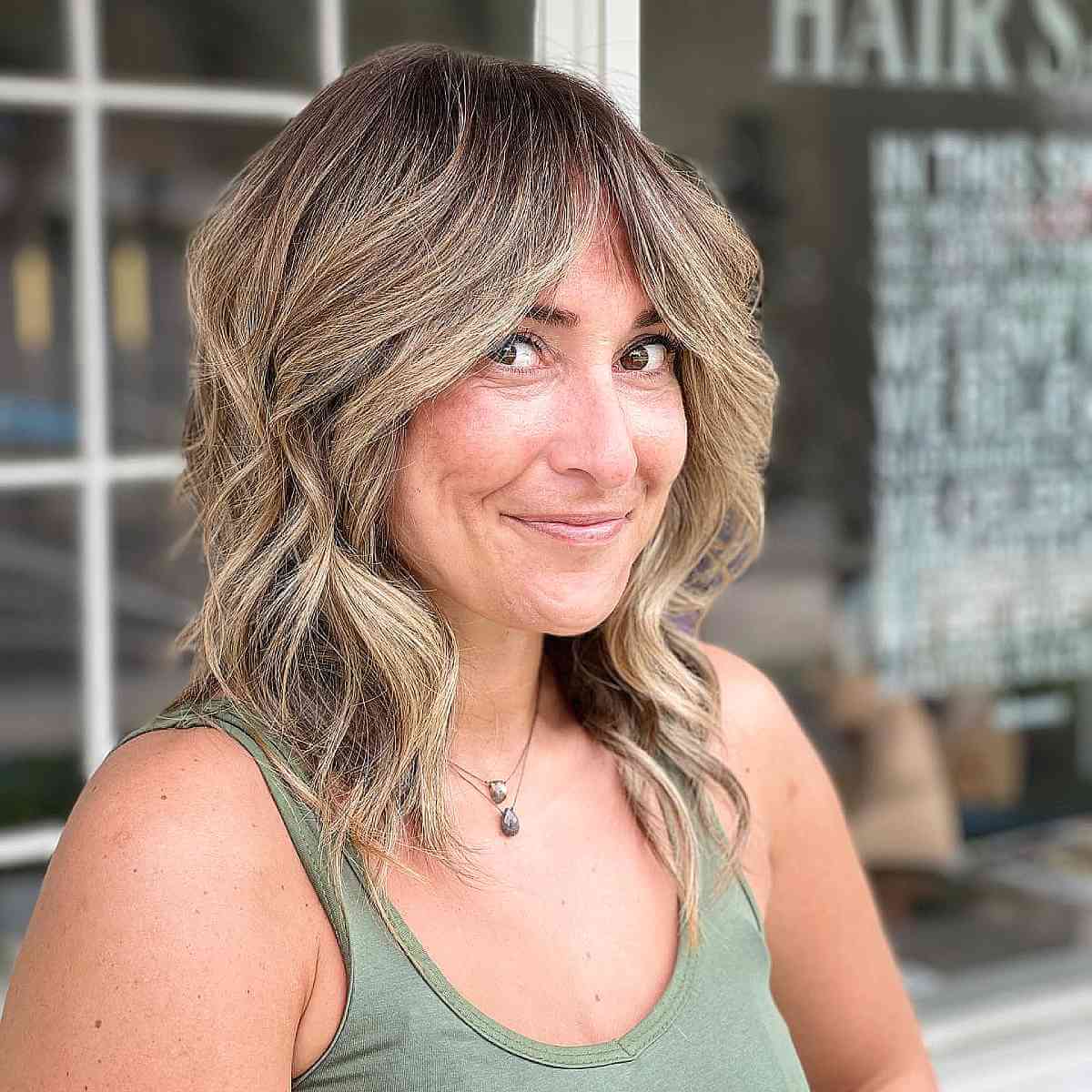 Blonde Long Bob with Curtain Bangs for Women Over 40