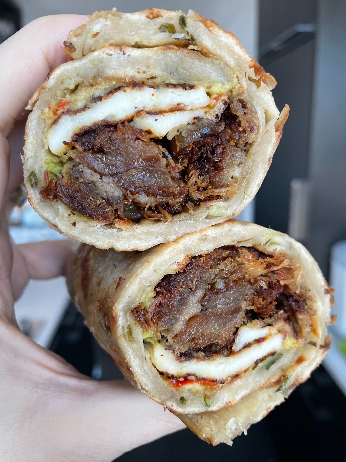 11 best New York Sandwiches of 2022 - Forsyth Fire Escape scallion burrito