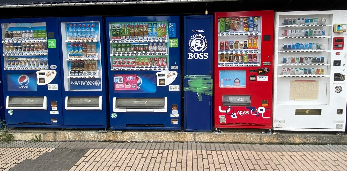 A row of vending machines

Description automatically generated with medium confidence