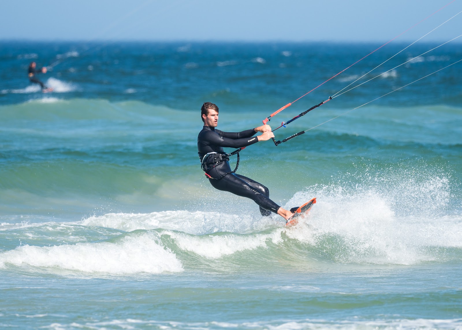 https://get.pxhere.com/photo/kitesurfing-surfing-equipment-and-supplies-windsports-wind-wave-kite-sports-wave-boardsport-surfboard-surface-water-sports-water-water-sport-wind-sea-extreme-sport-vacation-surfing-sky-fun-1546349.jpg