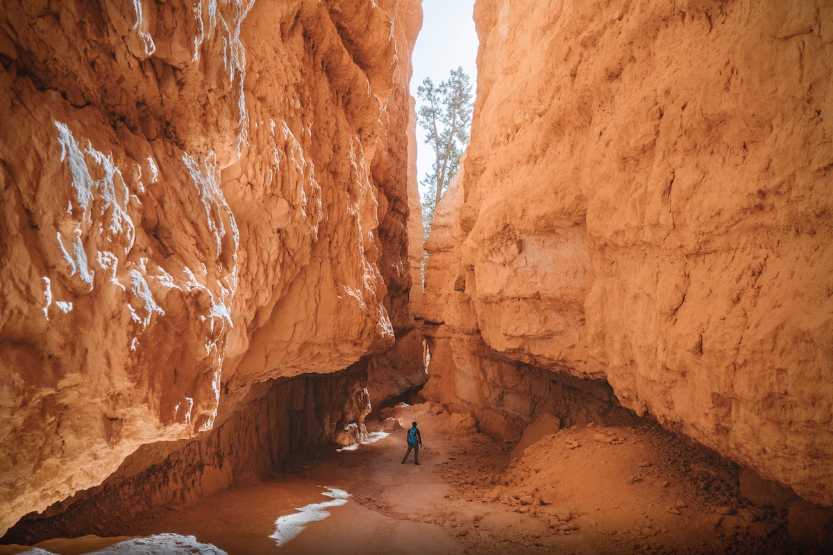 Hiker in a Bryce slot canyon