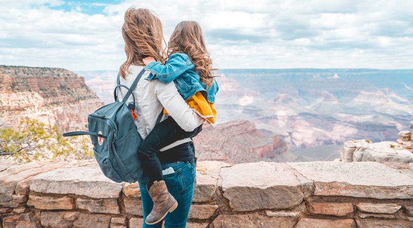 mother and daughter looking at the Grand Canyon